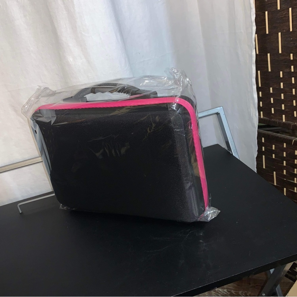 Carry Case in black with magenta zipper comes with 60 bottles and tools